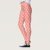 Witte kruisstiften op perziken leggings (Links)