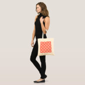 Witte kruisstiften op perziken tote bag (Voorkant (model))