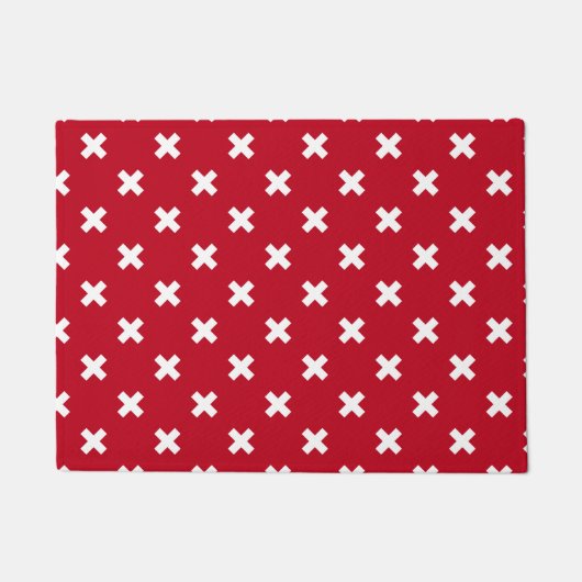 Witte kruisstiften op rood deurmat (Voorkant)