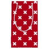 Witte kruisstiften op rood klein cadeauzakje (Voorkant)