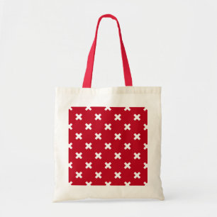Witte kruisstiften op rood tote bag