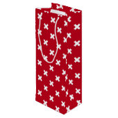 Witte kruisstiften op rood wijn cadeautas (Achterkant Gekanteld)