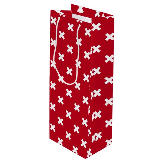 Witte kruisstiften op rood wijn cadeautas (Voorkant Gekanteld)