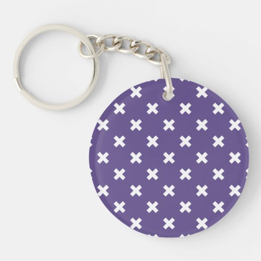Witte kruisstiften op ultraviolet sleutelhanger (Voorkant)