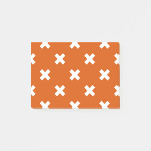 Witte kruisstiften op verbrand sinaasappel post-it® notes