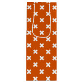 Witte kruisstiften op verbrand sinaasappel wijn cadeautas (Voorkant)