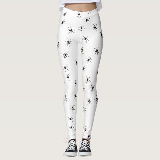 Witte legging gevuld met zwarte spinnen (Voorkant)