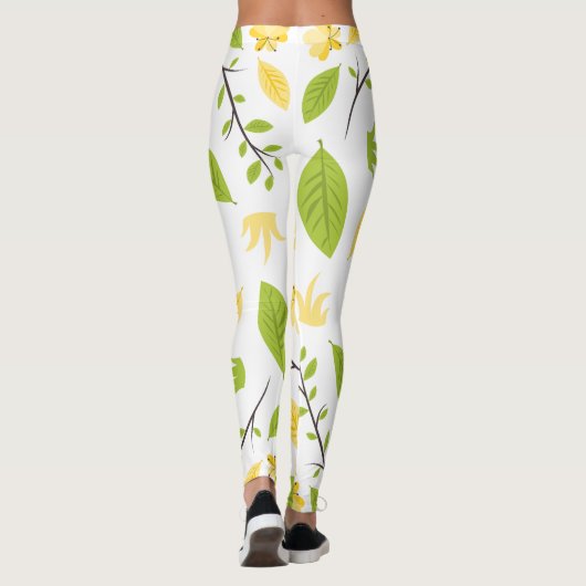 Witte legging met groene bladeren en gele bloem (Achterkant)