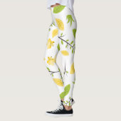Witte legging met groene bladeren en gele bloem (Links)
