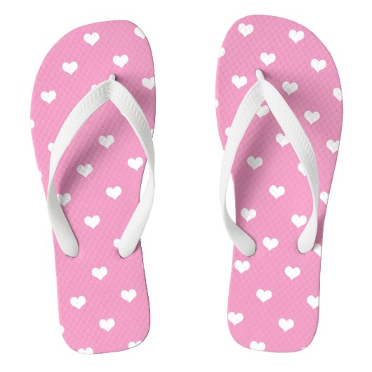 Witte liefdesharten op roze teenslippers (Voetbed)