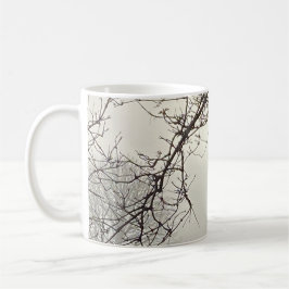 Witte lucht en zon dramatisch omlijst door Mok