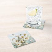 Witte madeliefjes en lieveheersbeestjes in de lent kartonnen onderzetters (Insitu)