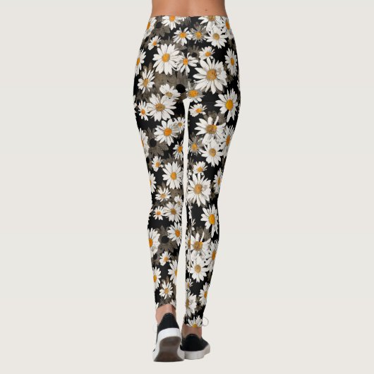 Witte madeliefjes op zwart bloemmotief leggings (Achterkant)