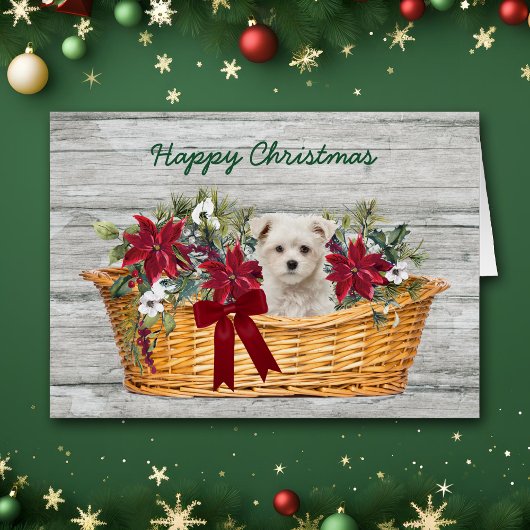 Witte Maltese puppy met kerstkaart voor mandje