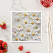 Witte margrieten over noodlijdend papier servet (Insitu)