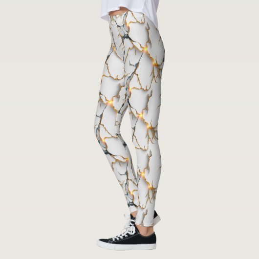 Witte marmertextuur met gloeiende gouden aders leggings (Links)