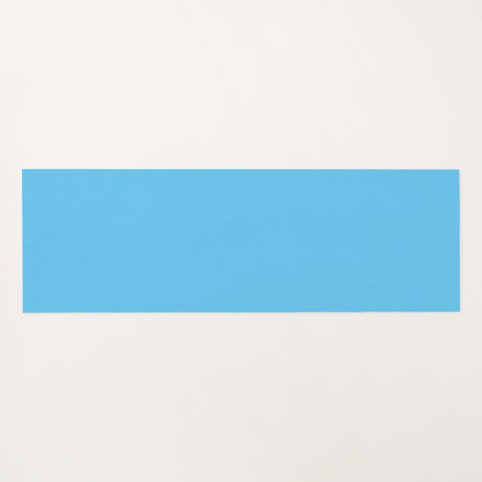 Witte motorkap met zwarte punaises op blauw yogamat (Achterkant (horizontaal))