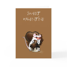 Witte muis met een chocolade hart