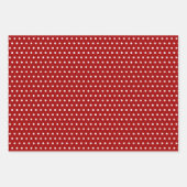 Witte olieplepels op zwarte rode stippen inpakpapier vel (Voorkant)