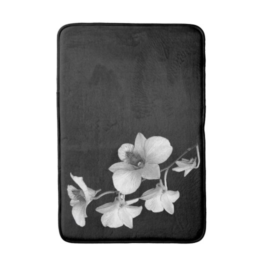 Witte orchidee op zwarte badmat II (Voorkant Verticaal)