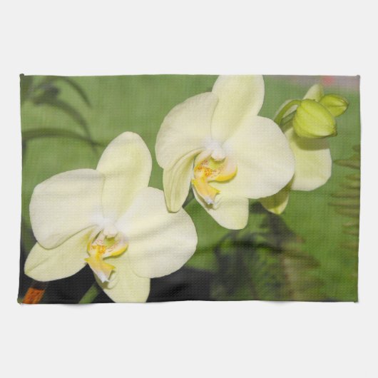 Witte orchideeën op een groene achtergrond theedoek (Horizontaal)