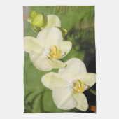 Witte orchideeën op een groene achtergrond theedoek (Verticaal)