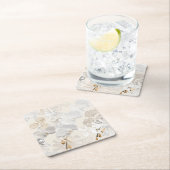 Witte orchideeën op een lichte crème kartonnen onderzetters (Insitu)