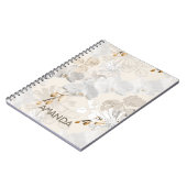 Witte orchideeën op een lichte crème notitieboek (Linkerzijde)