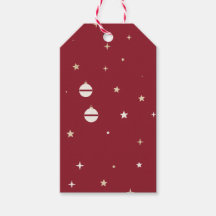 Witte ornamenten en sterren op rood