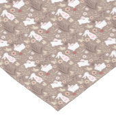 Witte paaskonijntjes op bruine tafelloper (Hoek)