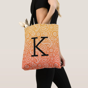 Witte paisleypatroon in rood tot geel ombre tote bag