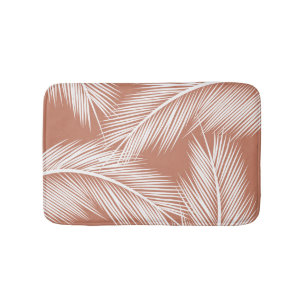 Witte palmbladeren op terracotta kleur achtergrond badmat