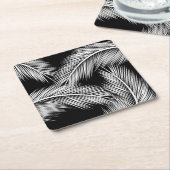 Witte palmbladeren op zwarte achtergrond kartonnen onderzetters (Schuin)