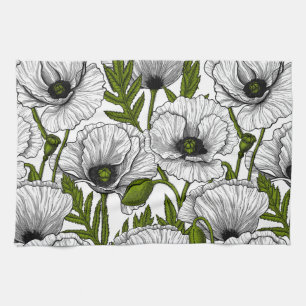 Witte papaver op wit theedoek