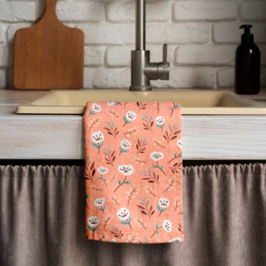 Witte papavers op rode keukenhanddoek