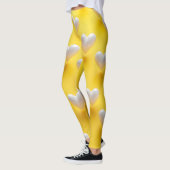 Witte parelharten op geel leggings (Links)