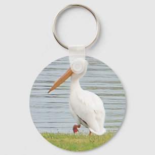 witte pelikaan langs de kust sleutelhanger