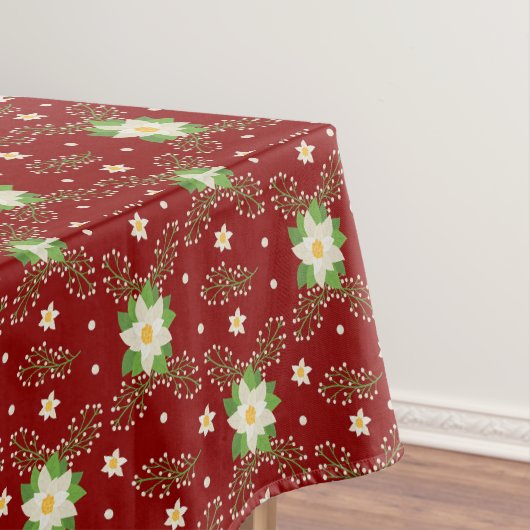 Witte Poinsettias Groene bladeren Kerstmis op Rood Tafelkleed (Voorbeeld)