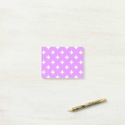 Witte polka kruist lila post-it® notes (Op bureau)