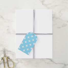 Witte polka kruist op babyblauw cadeaulabel