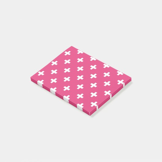 Witte polka kruist op fuchsia post-it® notes (Schuin)