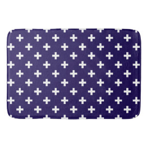 Witte polka kruist op marineblauw badmat