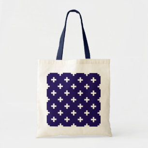 Witte polka kruist op marineblauw tote bag
