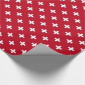 Witte polka kruist op rood cadeaupapier (Hoek)