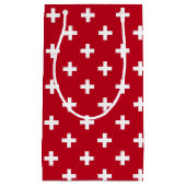 Witte polka kruist op rood klein cadeauzakje (Voorkant)