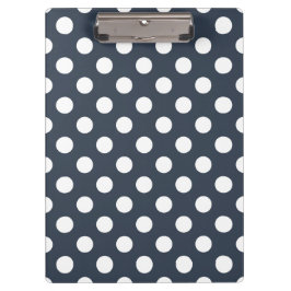 Witte polka-stippen op blauw-grijs klembord