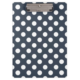 Witte polka-stippen op blauw-grijs klembord