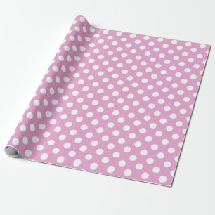 Witte polka stippen op bleek roze cadeaupapier