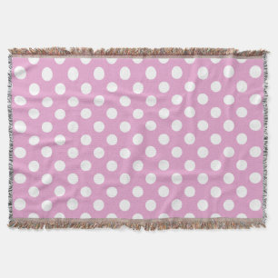 Witte polka stippen op bleek roze deken