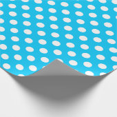 Witte polka stippen op elektrisch blauw cadeaupapier (Hoek)